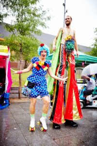 skater-and-stilt-walker